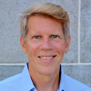 headshot of John George