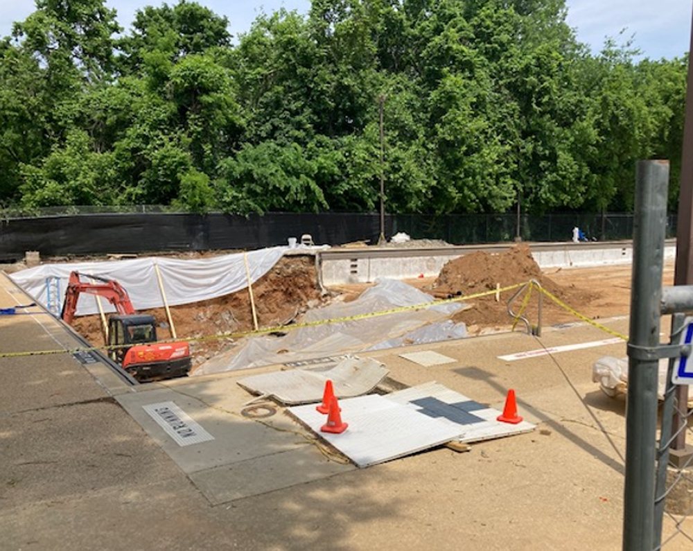 Empty Pool with huge repair of pool wall