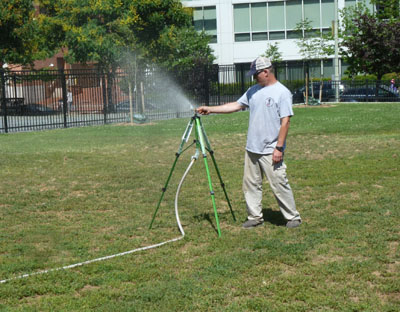 Landscaper and sprinkler